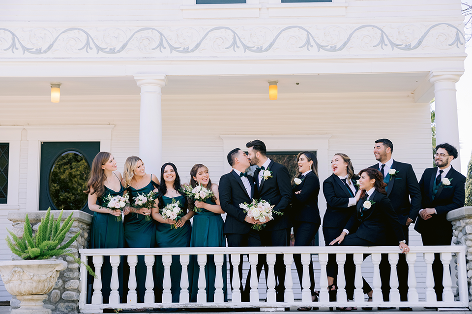 Bridal party posing on balcony