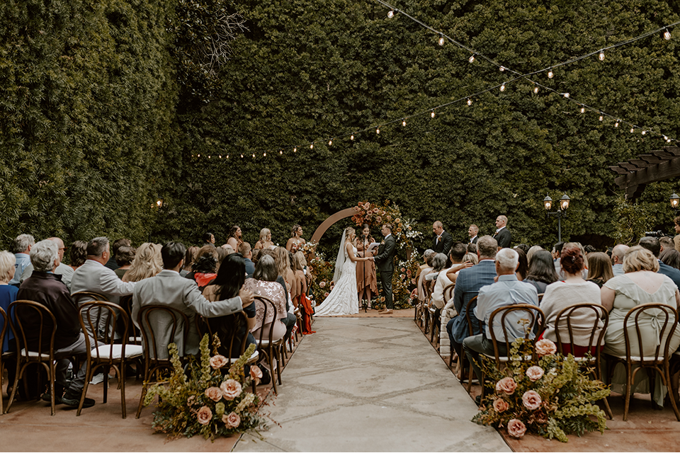 Beautiful wedding ceremony with the couple exchanging vows in a picturesque setting