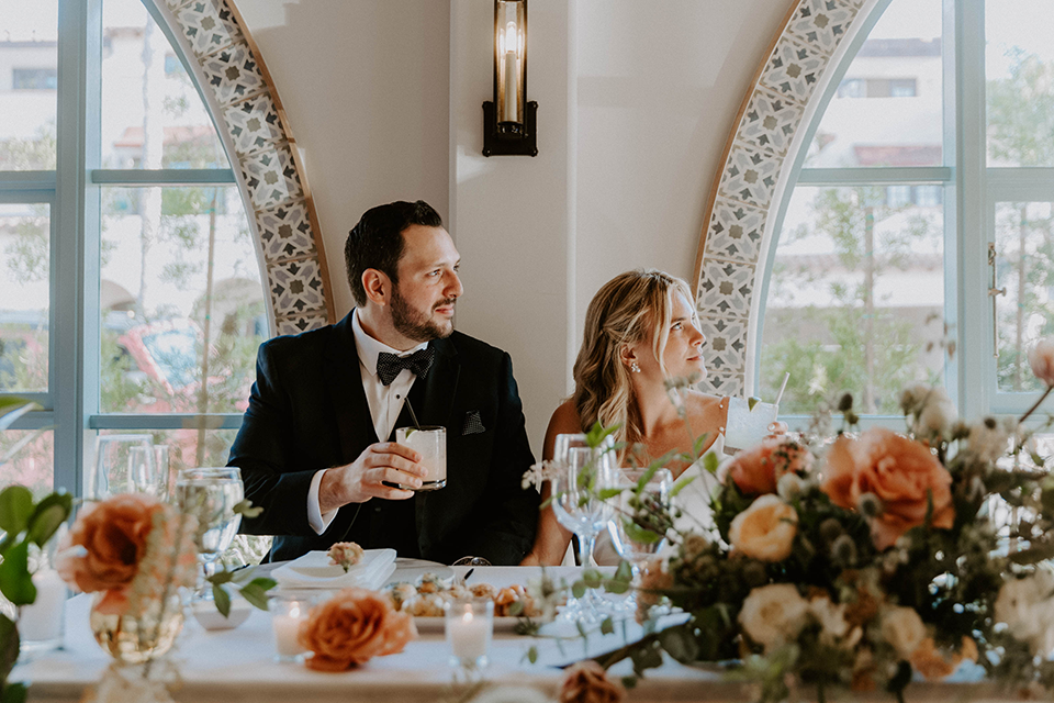 bride and groom at table