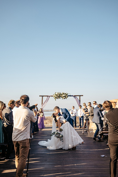 kissing down the aisle