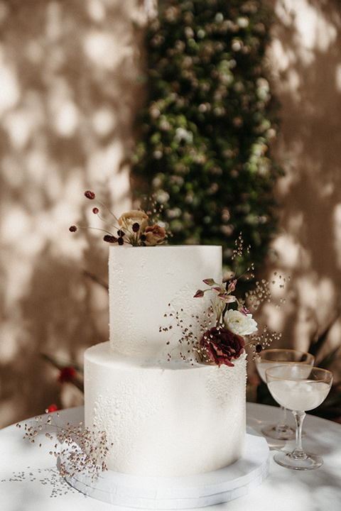 white tiered cake with florals
