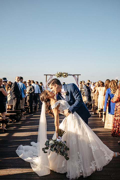 kissing down the aisle