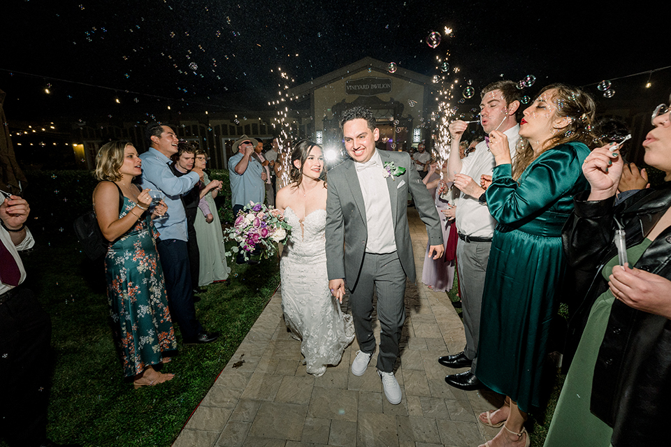 grand exit with bubbles