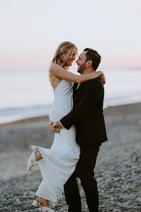 bride and groom on beach