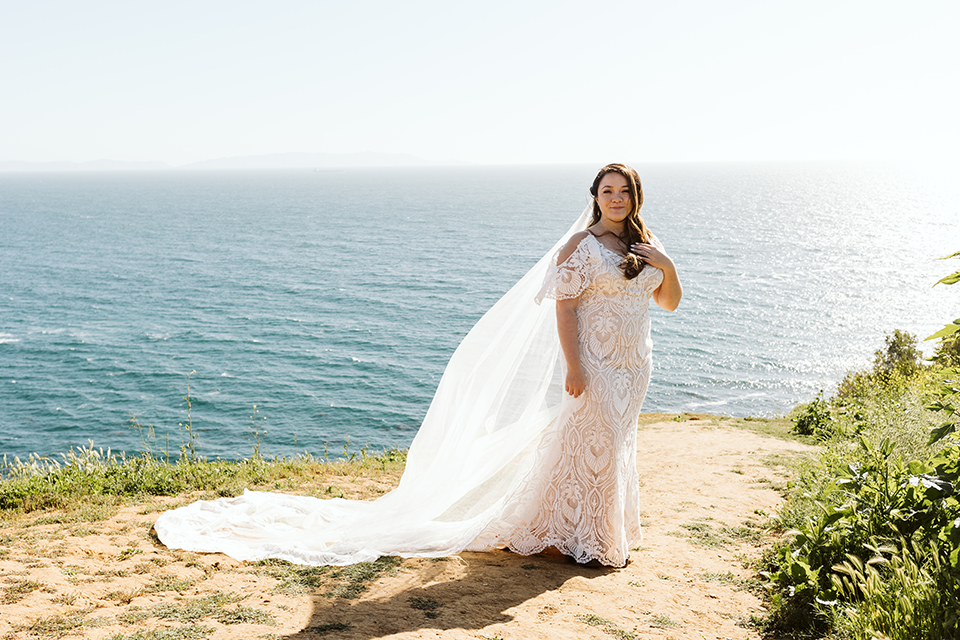 Bride standing in the wind