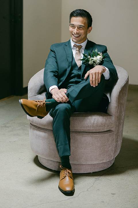 Groom sitting in chair